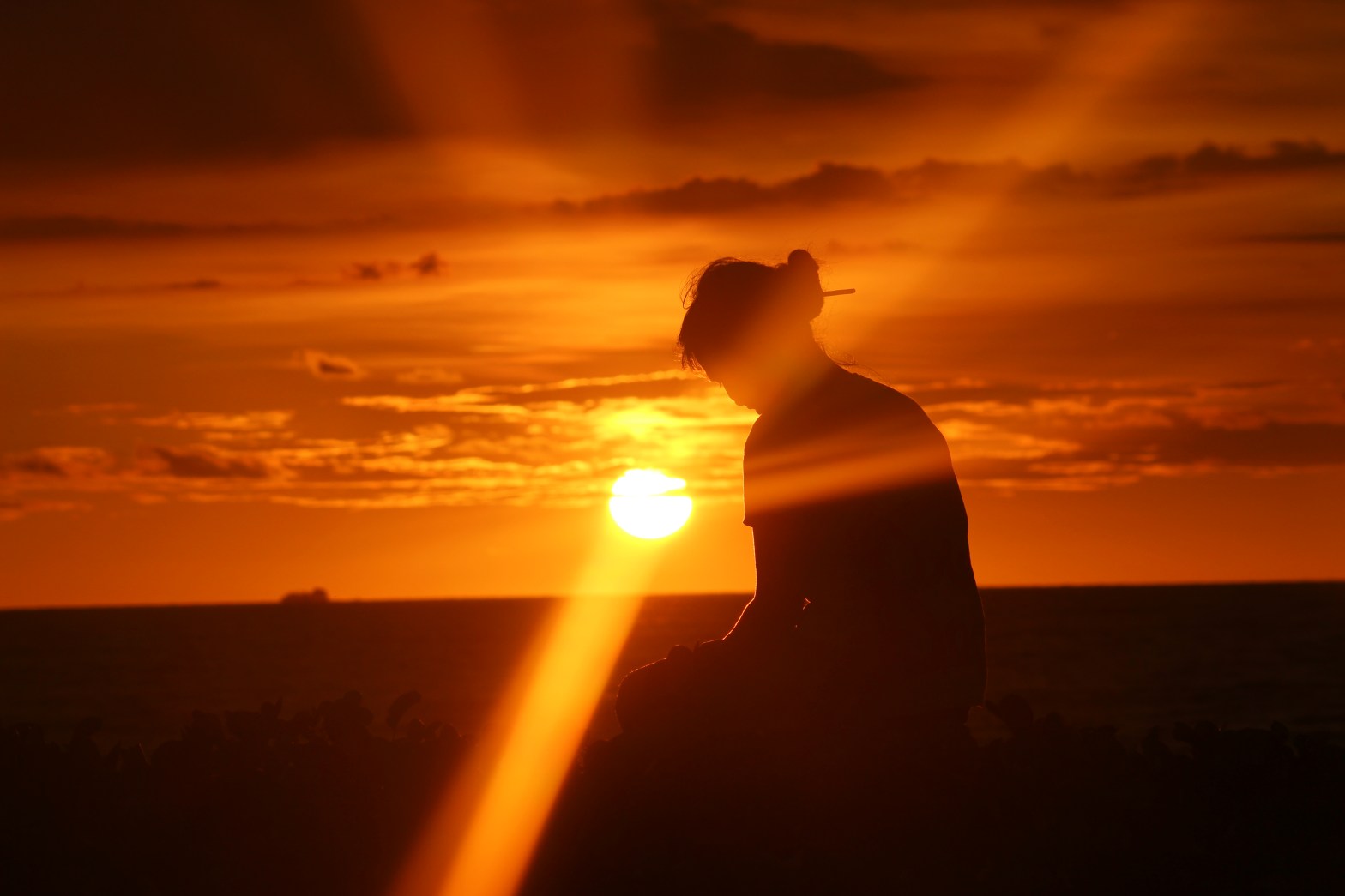 Sunset sky and silhouette of person